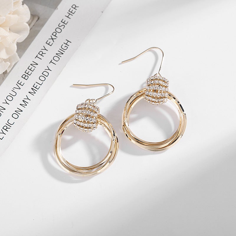 Boucles D'oreilles Géométriques Superposées en Diamant